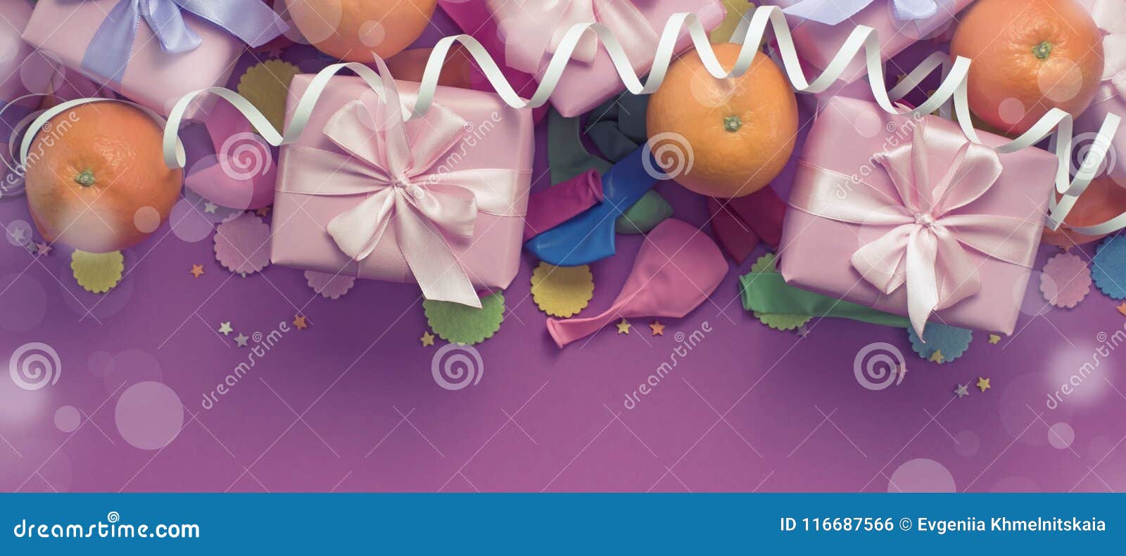 banner decorative composition three boxes with gifts satin ribbon bow oranges confetti serpentine birthday party.