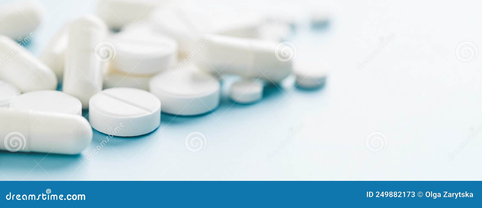 White Pills on Blue Background. Stock Image Image of treatment