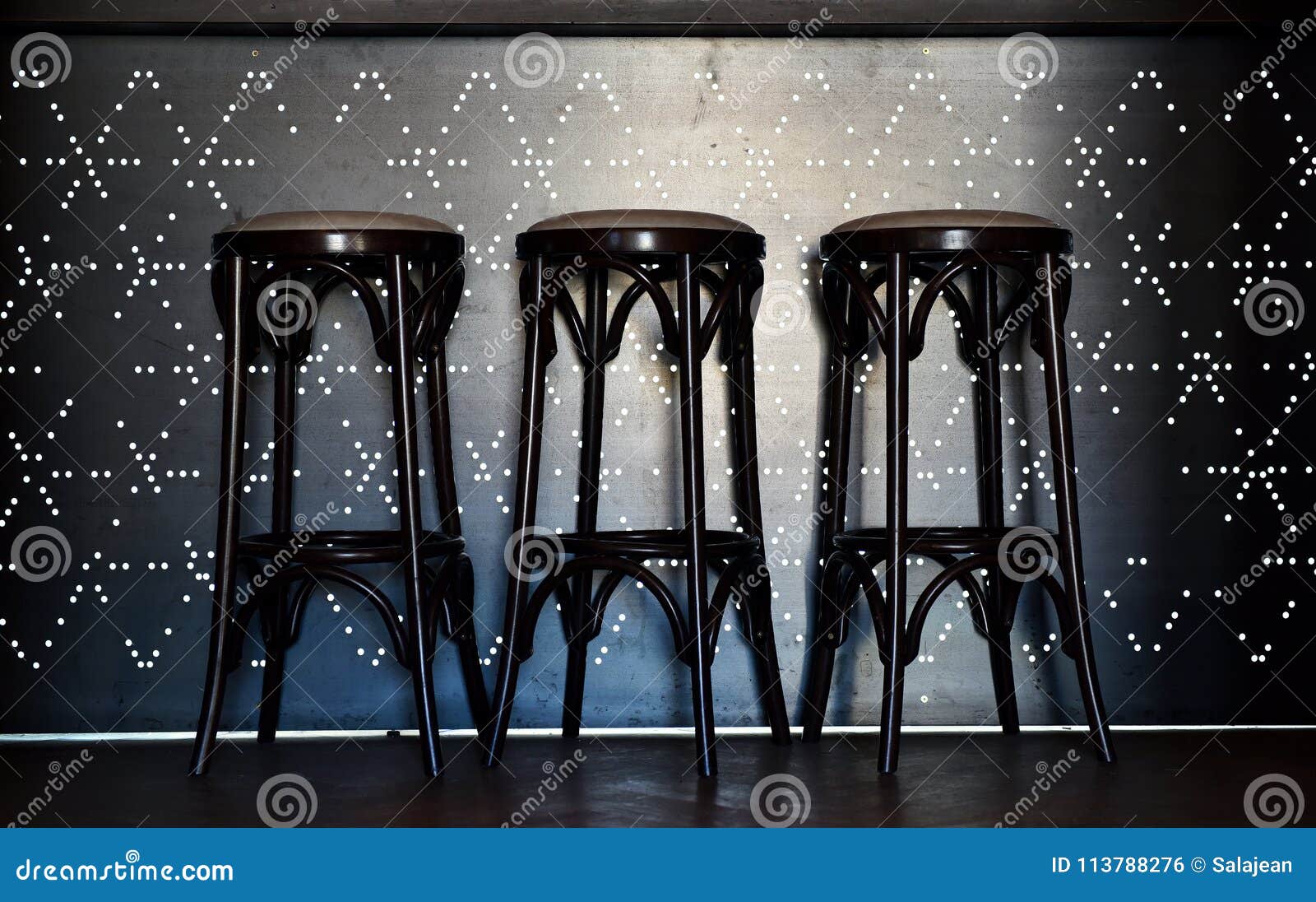 Bar Counter With High Chairs In Cozy Restaurant Stock Photo