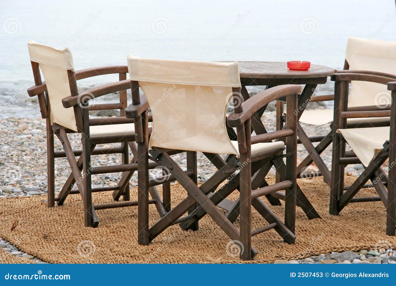 Bar Table and Chairs stock image. Image of pebbles, beach - 2507453