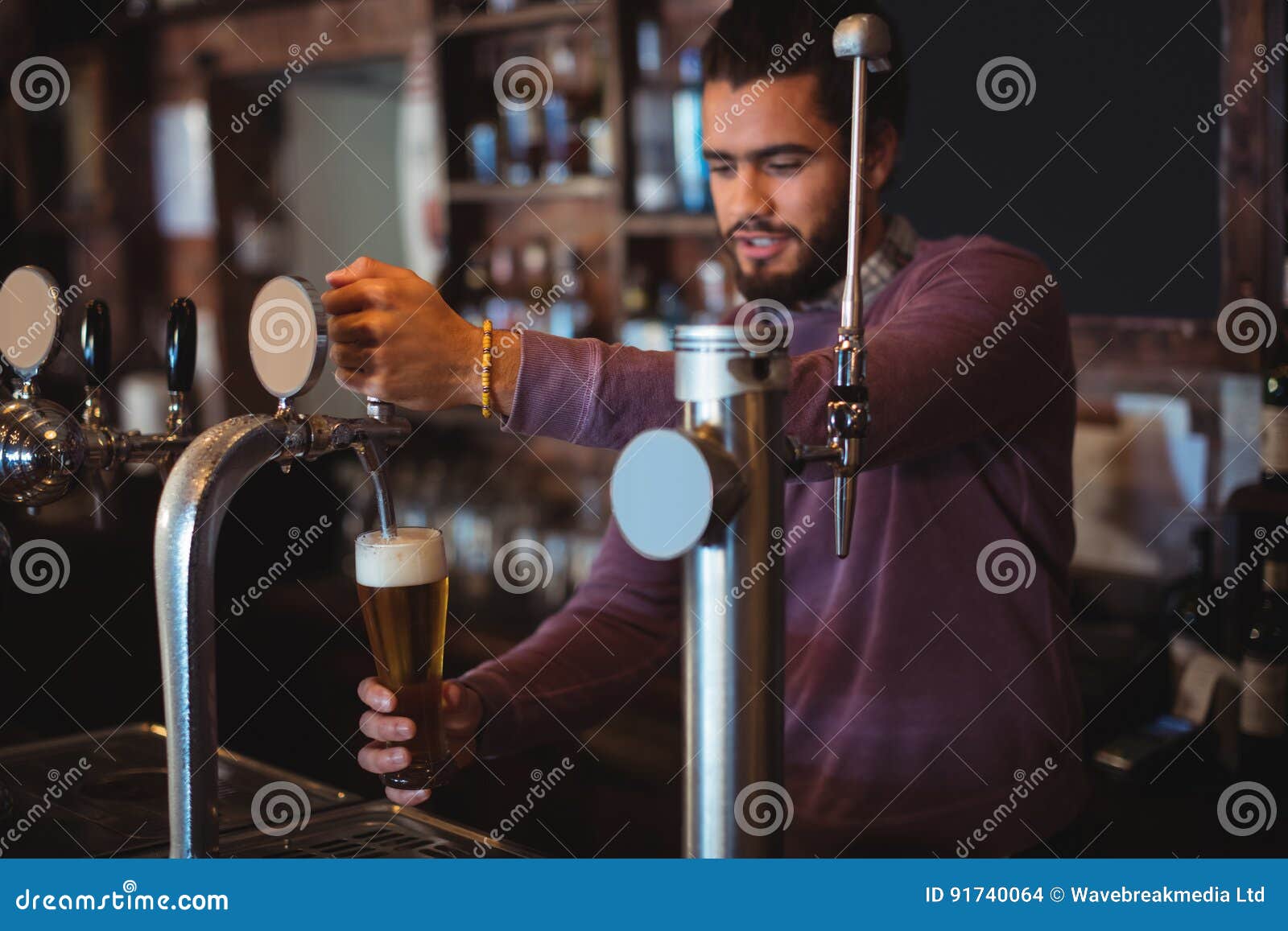 Bar Tender Filling Beer from Bar Pump Stock Photo Image of people