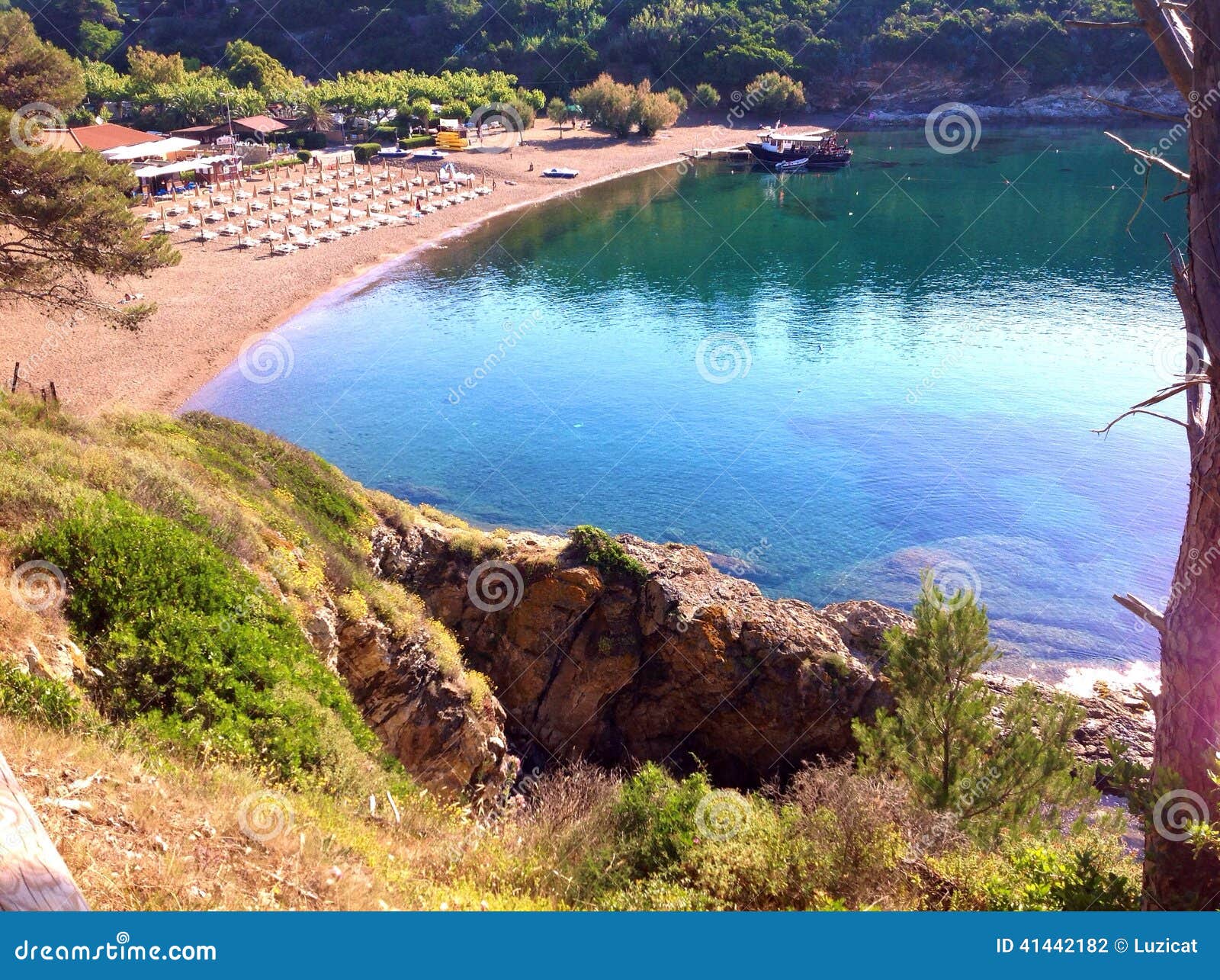 barbarossa beach in porto azzurro, italy