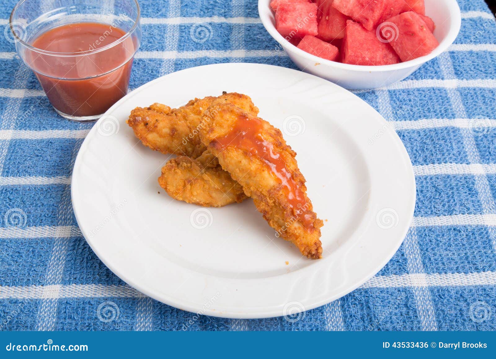Barbecue Chicken Strips with Sauce and Watermelon Stock Photo Image