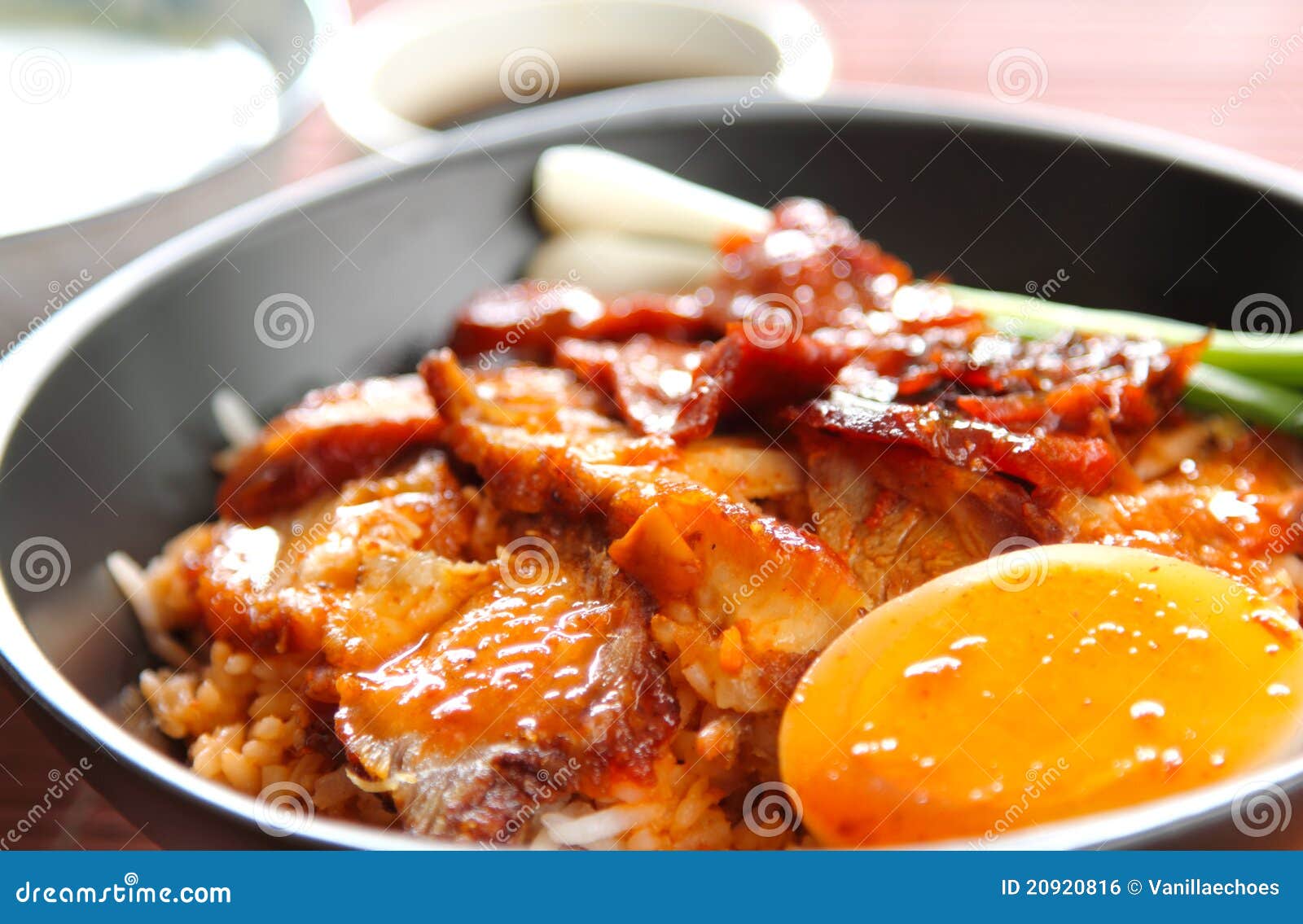 Barbecue and Crispy Pork with Gravy Sauce on Rice Stock Photo Image