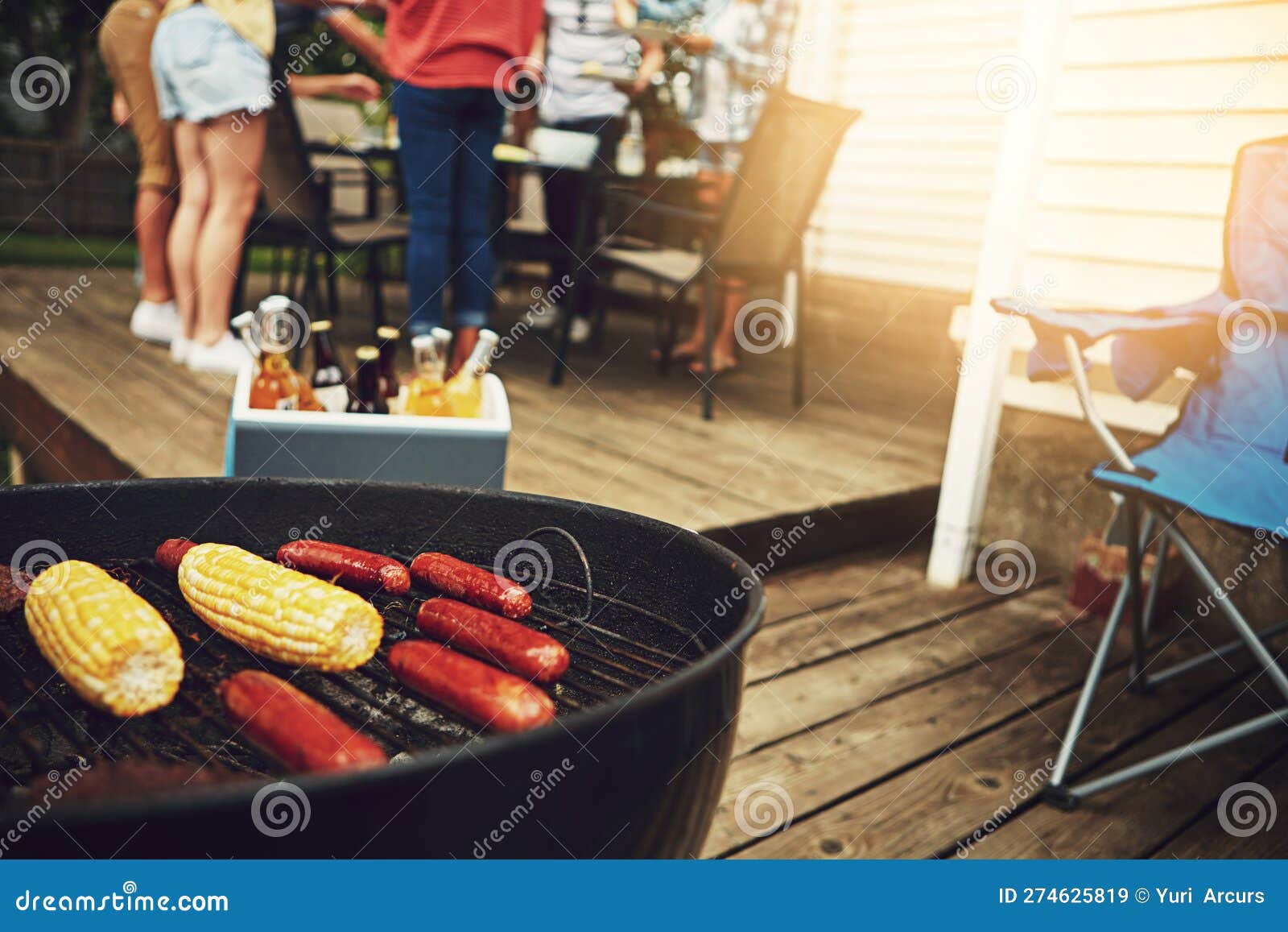 Barbecue Season is Here. a Group of Friends Having a Barbecue in the