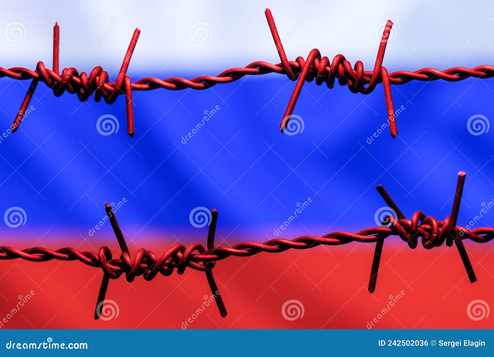 barbed wire on background of flag of russia. sanctions against russia