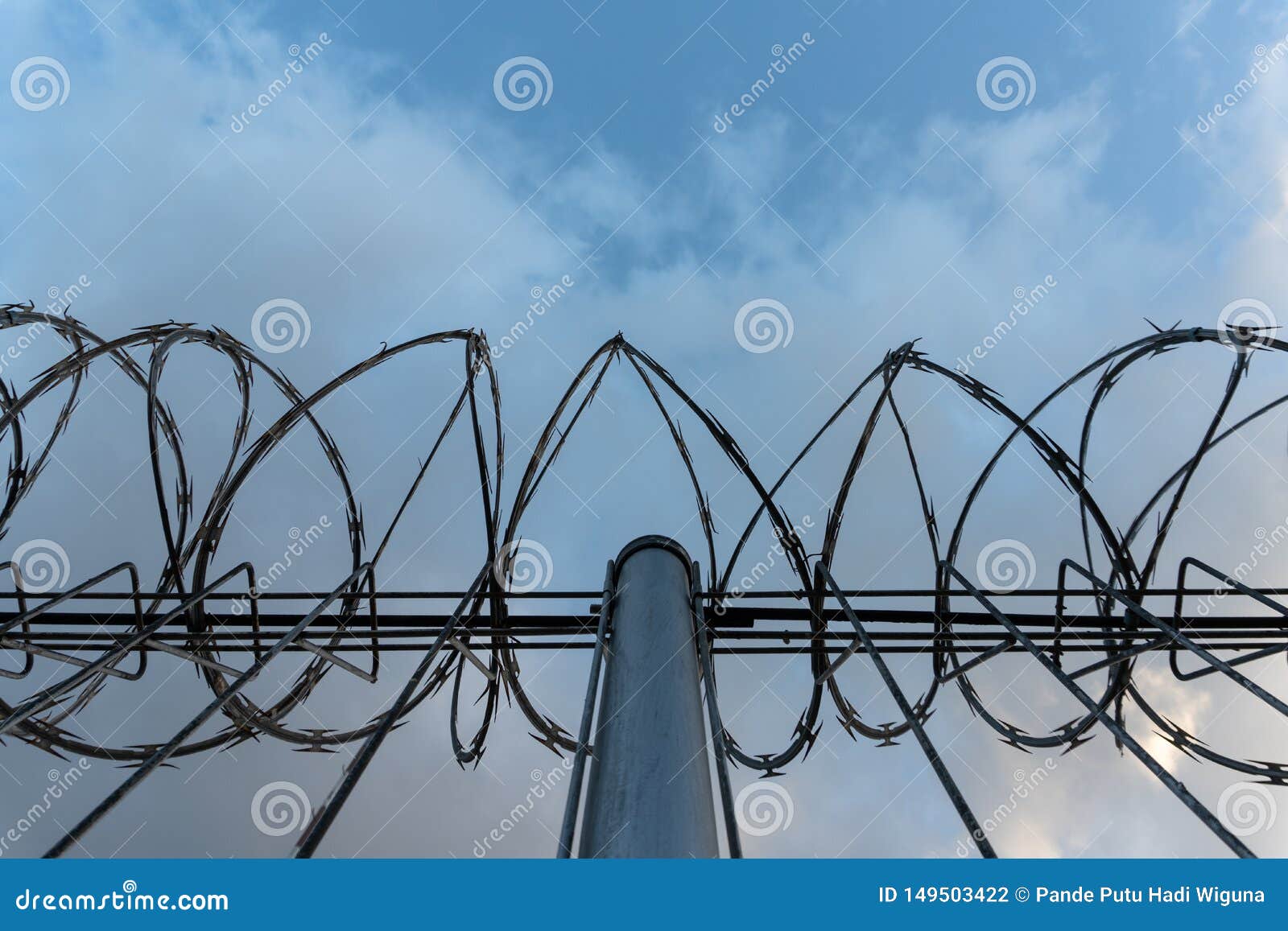 Barbed Wire Fence With Bright Blue Sky To Feel Silent And Lonely And ...
