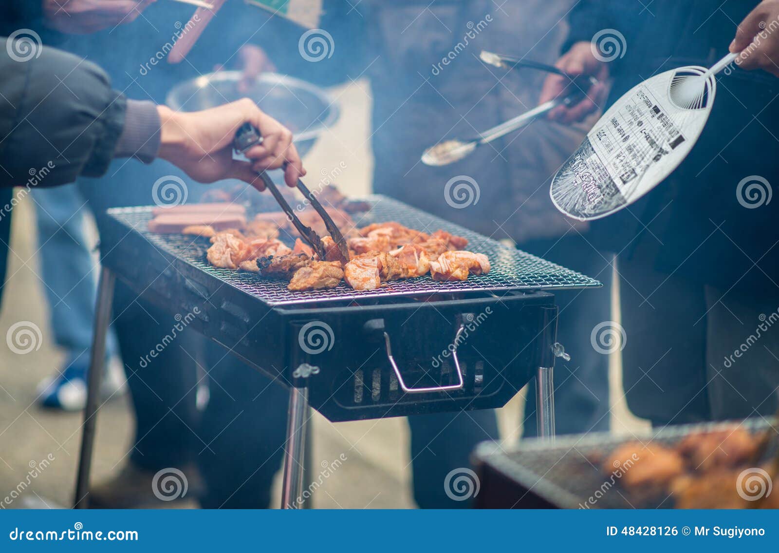 Barbeque editorial photo. Image of hand, meat, people 48428126