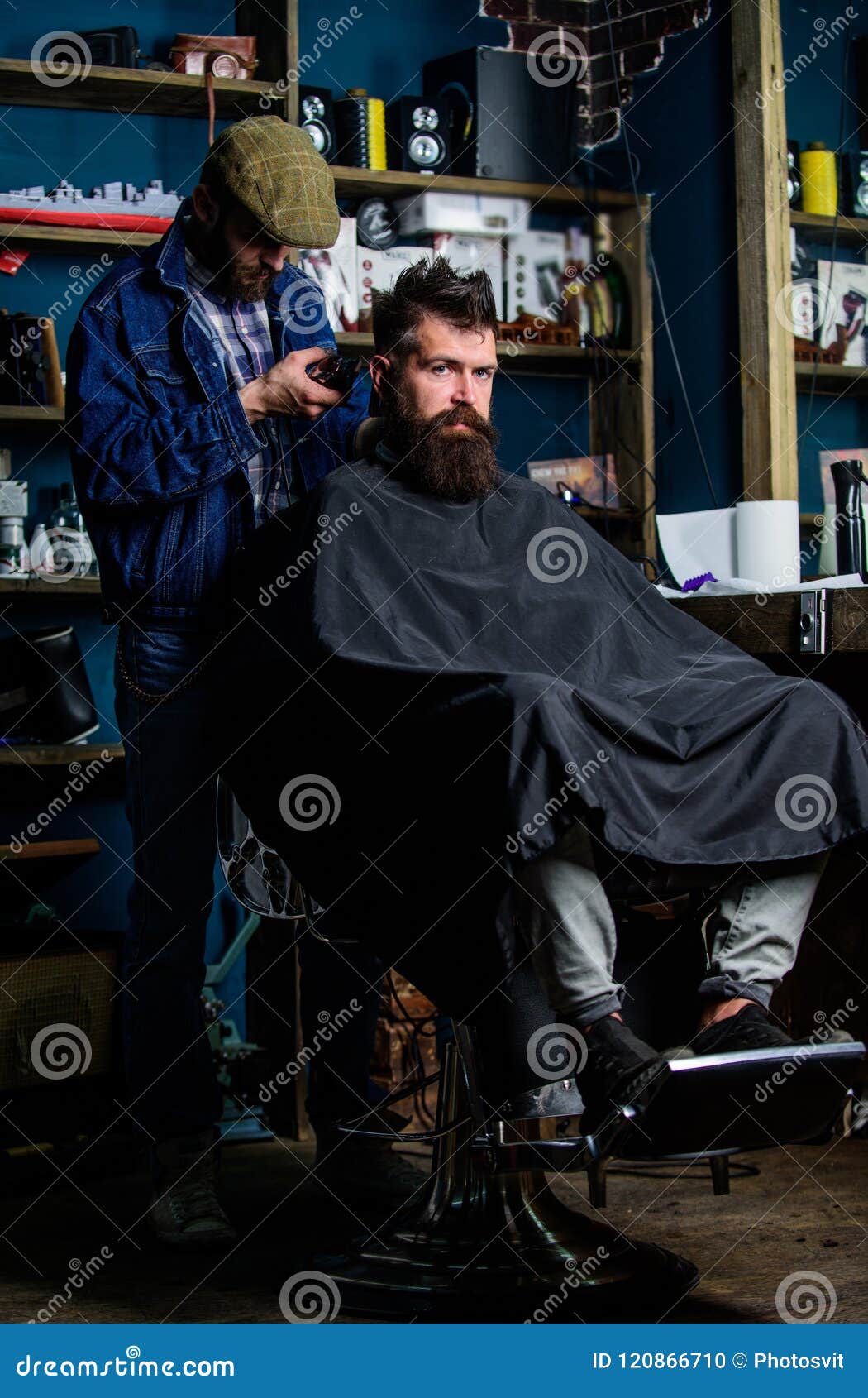 Barber with Clipper Trimming Hair on Nape of Client. Hipster Client ...