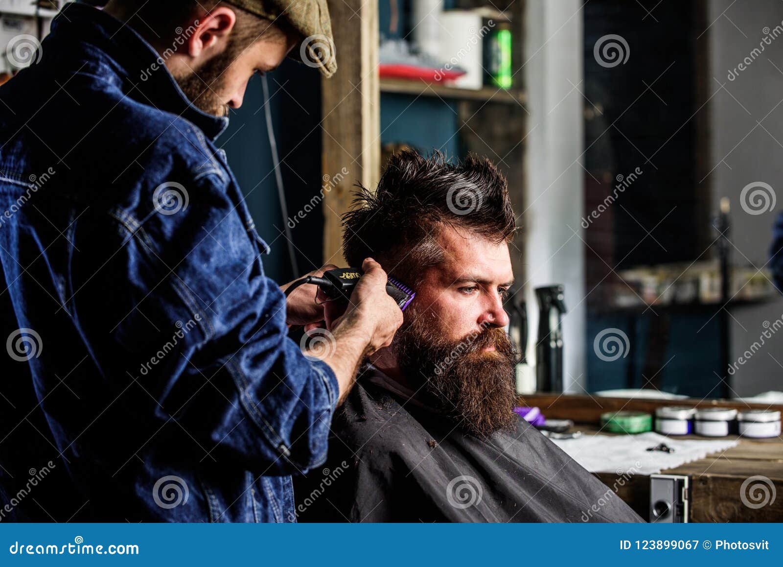 Barber with Clipper Trimming Hair on Temple of Client. Hipster Client ...