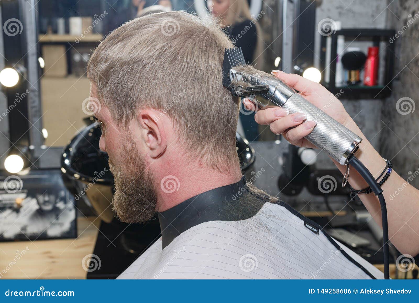 cutting hair with a machine