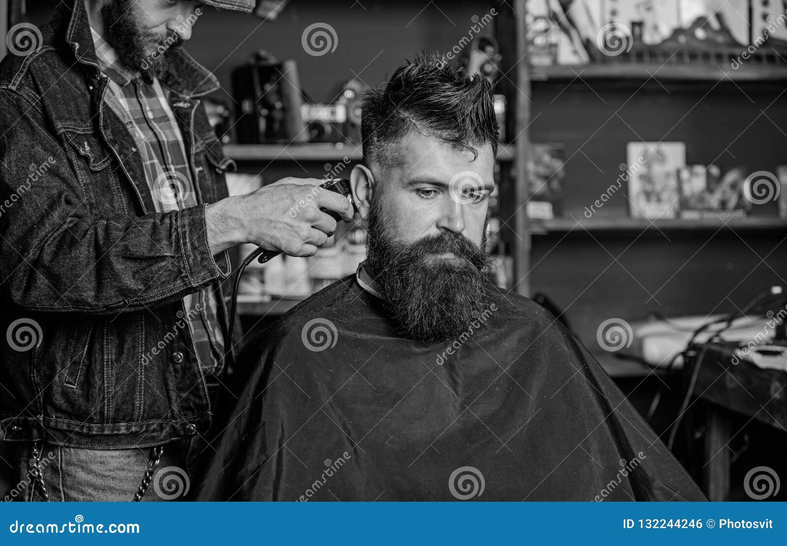 Barber with Hair Clipper Works on Hairstyle for Bearded Guy Barbershop ...