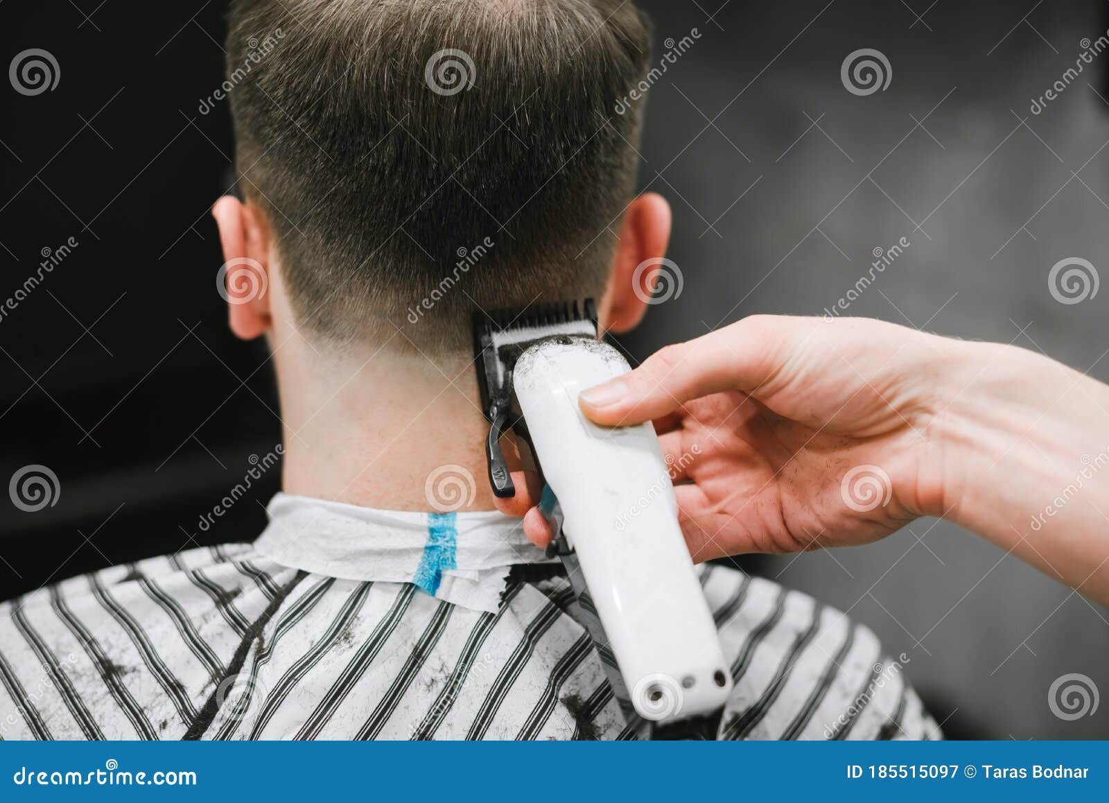Barber`s Hand with a Clipper Cuts the Back of a Man`s Neck. Haircuts in Barbershop. Hairdresser Shaves a Young Man Hair Clipper Stock Image - Image of beauty, closeup: 185515097 Barber`s Hand with a Clipper Cuts the Back of a Man`s Neck. Haircuts in Barbershop. Hairdresser Shaves a Young Man Hair Clipper Stock Image - Image of beauty, closeup: 185515097