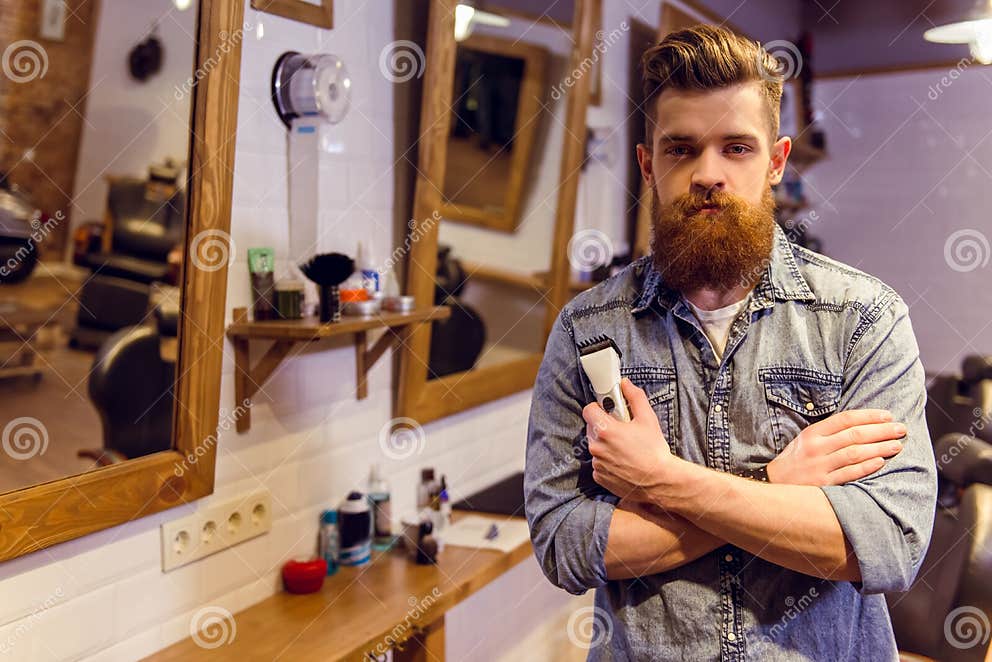At the barber shop stock image. Image of casual, mirror - 67319255