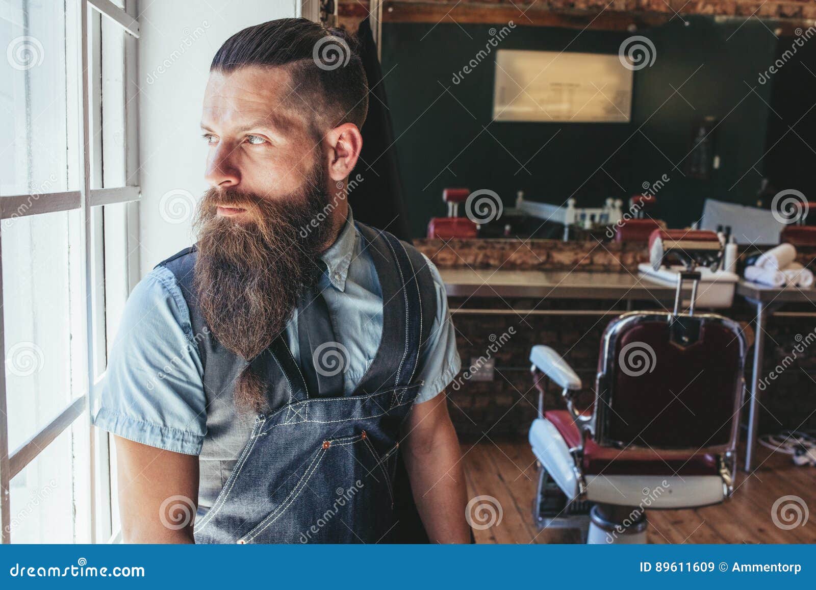Barber Standing by Window and Looking Away Stock Image - Image of ...
