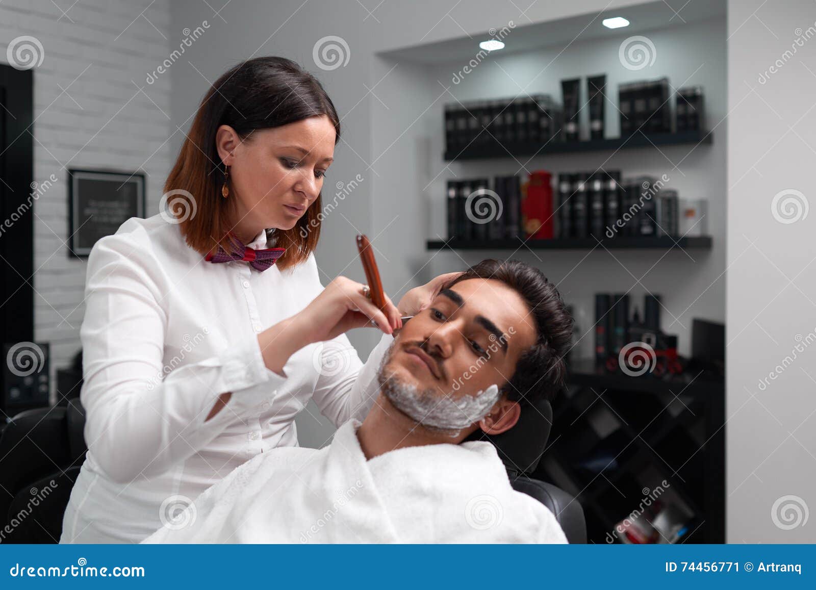 The Barber Woman Carefully Shaves Beard With Razor Stock 