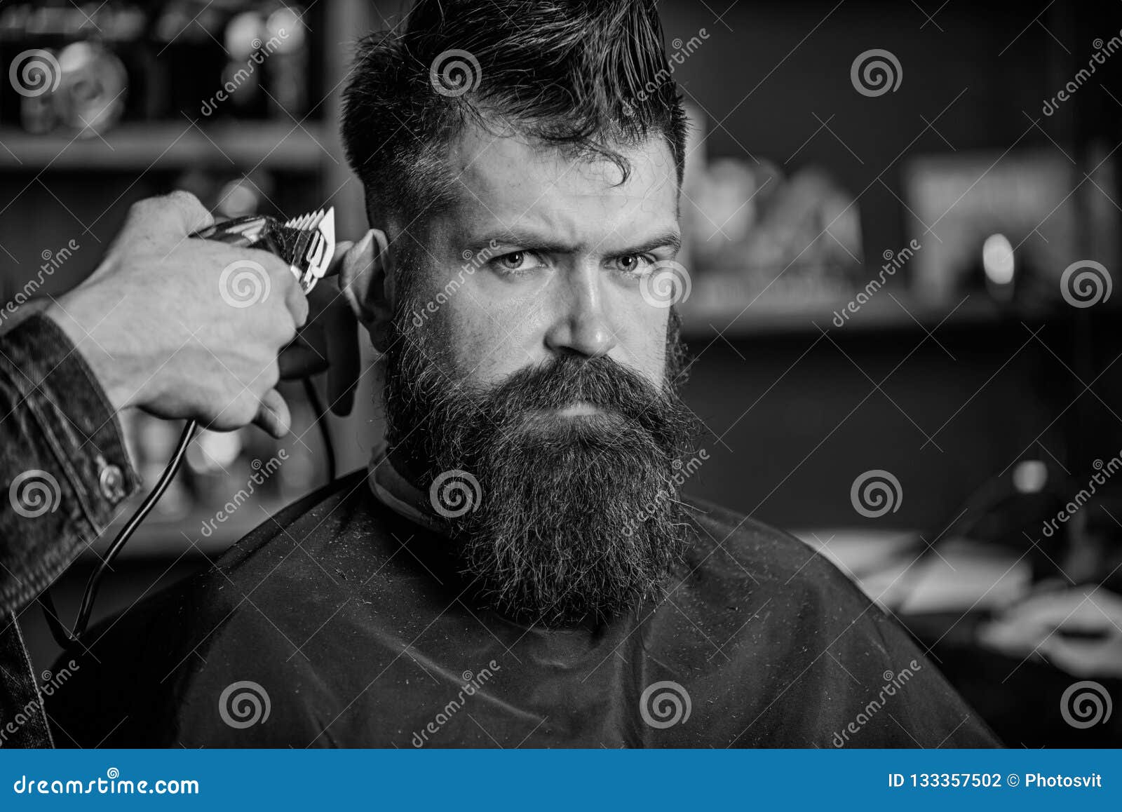Barber Works with Hair Clipper. Barbershop Concept. Hands of Barber ...