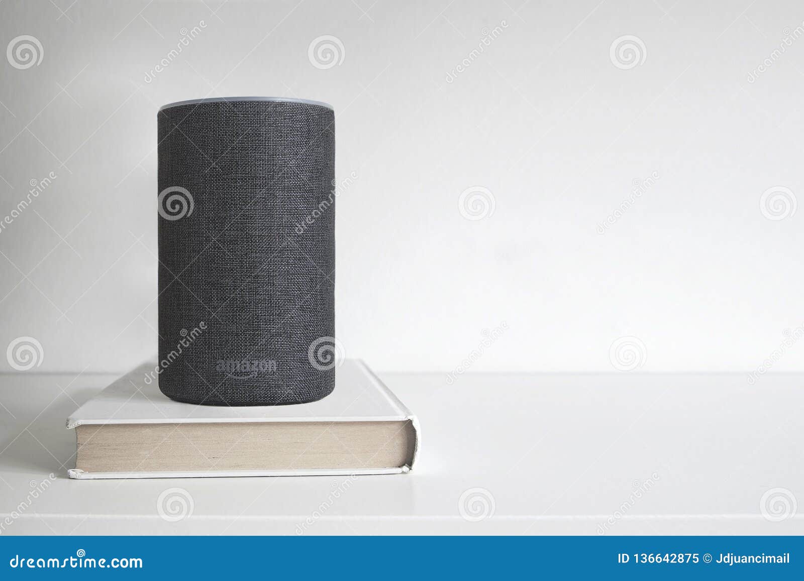 BARCELONA - JANUARY 2019: Amazon Alexa Smart Speaker on a Book on a ...