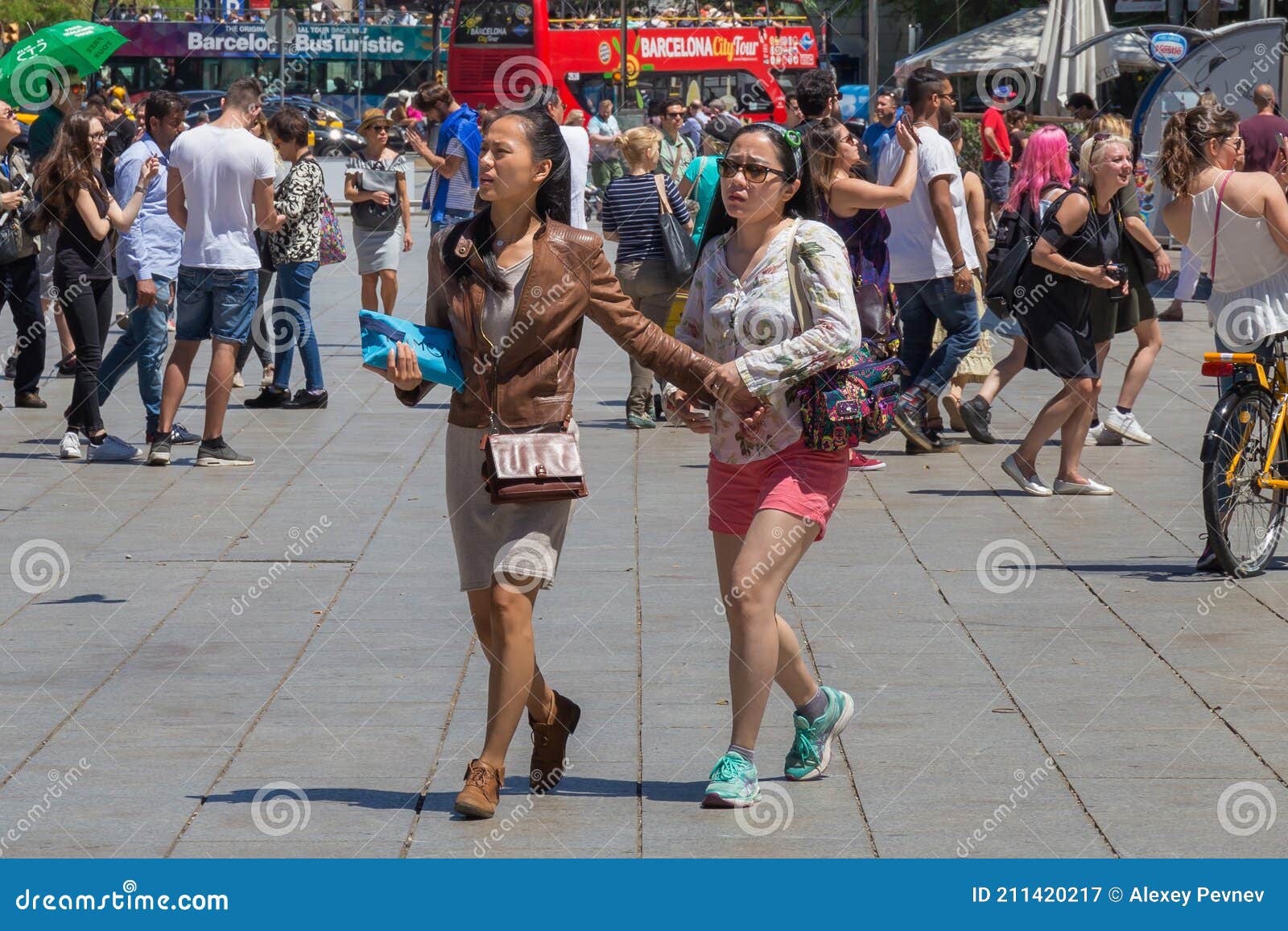 BARCELONA, SPAIN - MAY 15, 2017: Unknown Young Attractive Asian Women