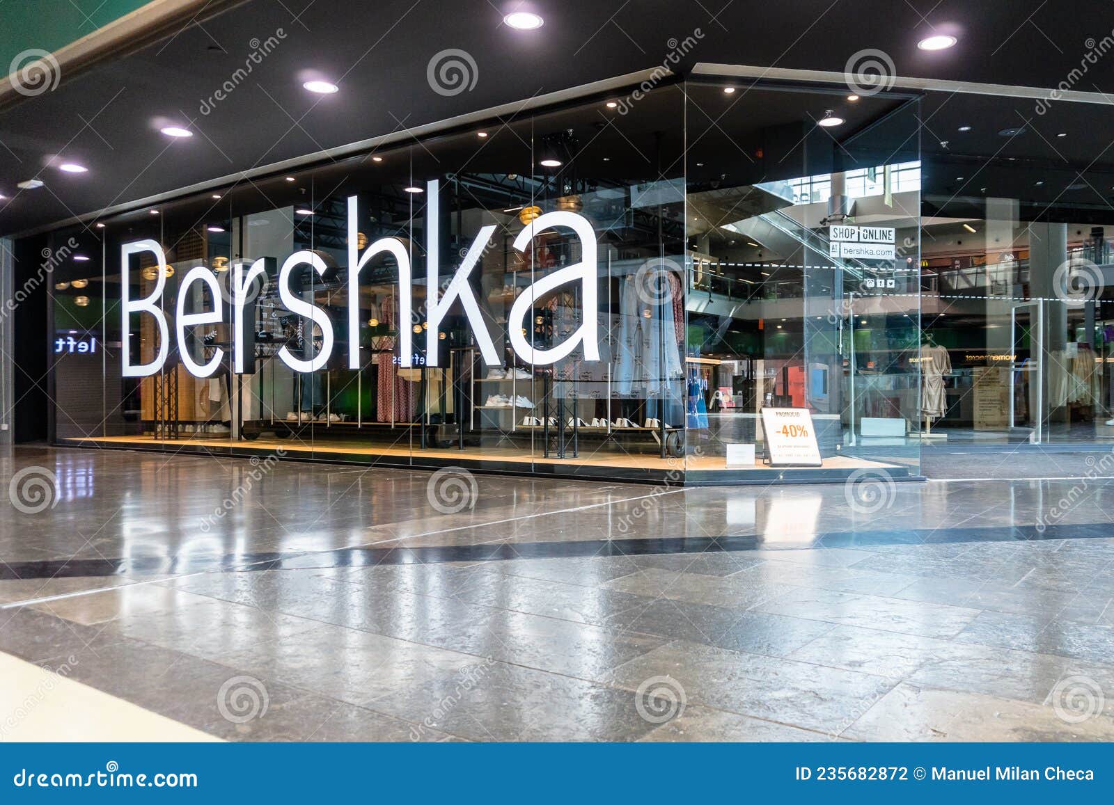 Barcelona, Spain - November 28, 2021.Logo and Facade of Bershka, a ...