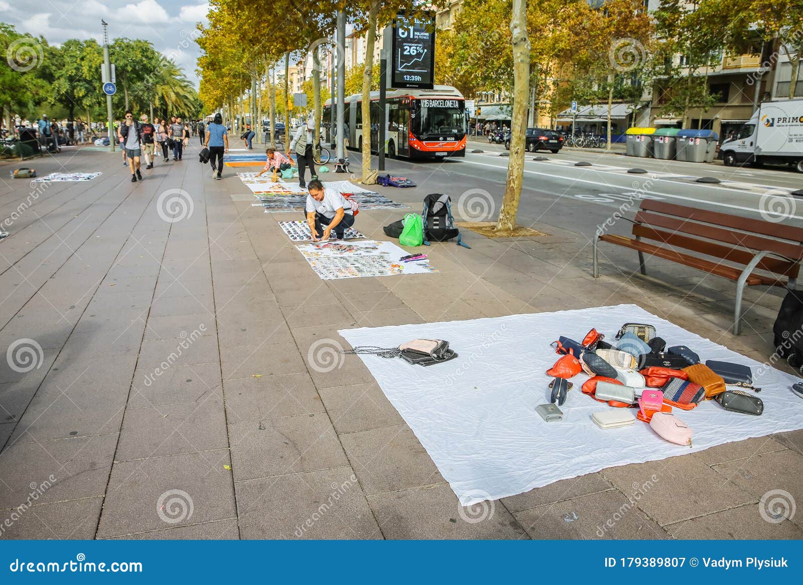 BARCELONA, SPAIN - OCTOBER 15, 2018: People Selling Illegal Things in