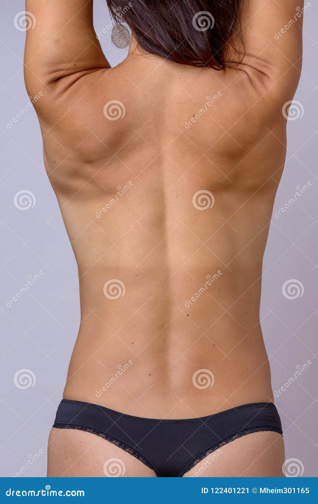 Bare Back of a Slender Athletic Toned Woman Stock Image - Image of girl,  head: 122401221