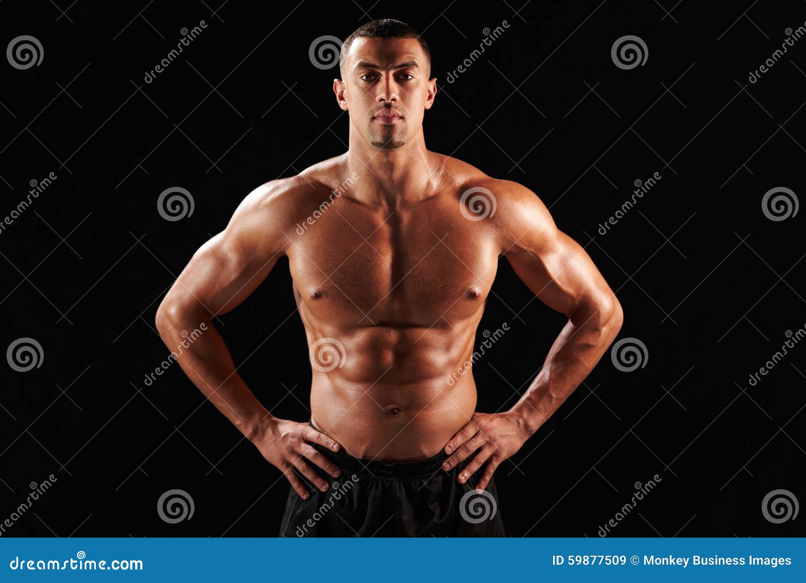 Bare Chested Male Body Builder with Hands on Hips Stock Image Image