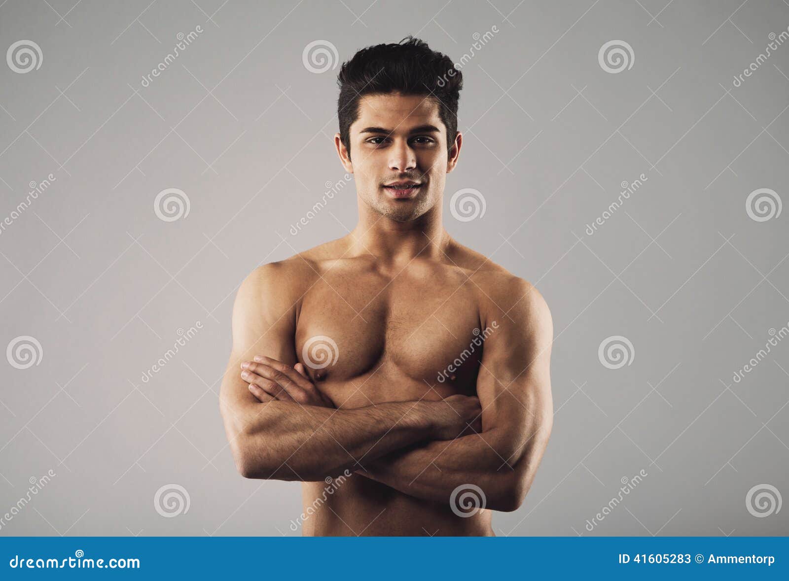 Bare-chested Muscular Man Standing on Grey Background Stock Image ...