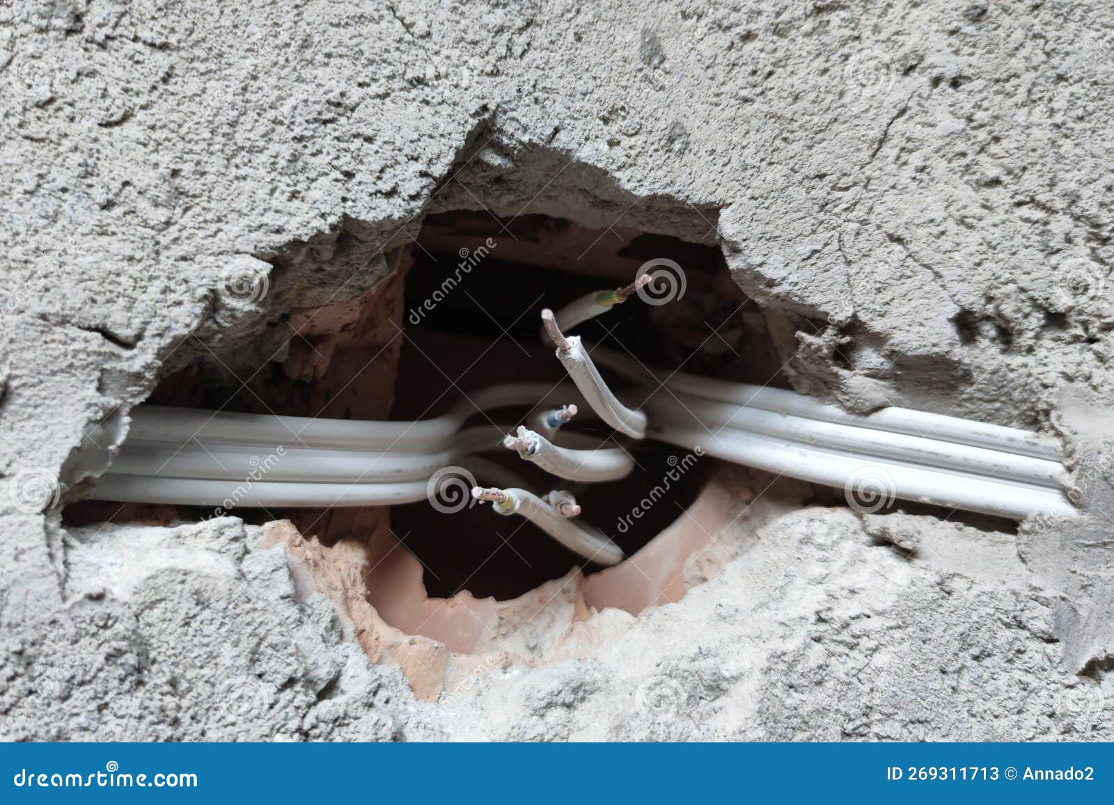 Bare Electrical Wires in a Concrete Wall, Installation of an Electrical