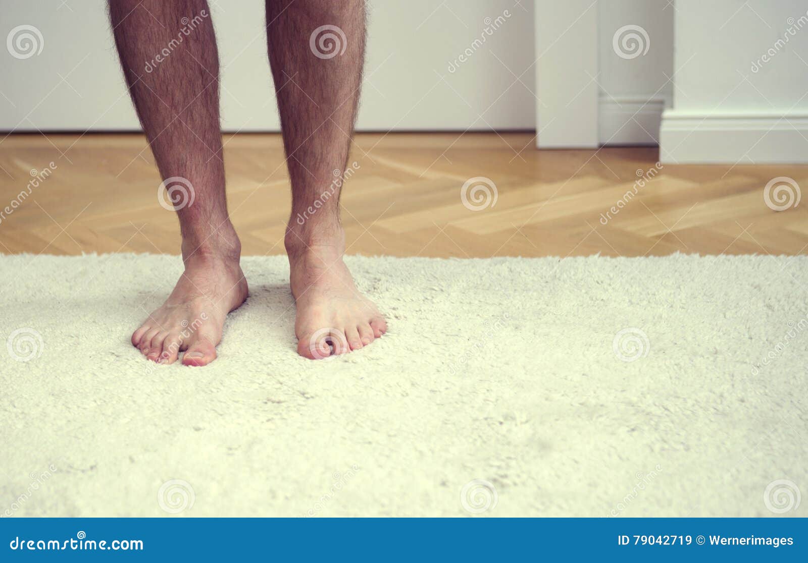 Bare Feet of Man Standing on White Carpet Stock Image Image of