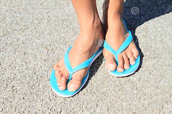Bare in flip-flops stock photo. Image of blue, feet, standing - 56806814