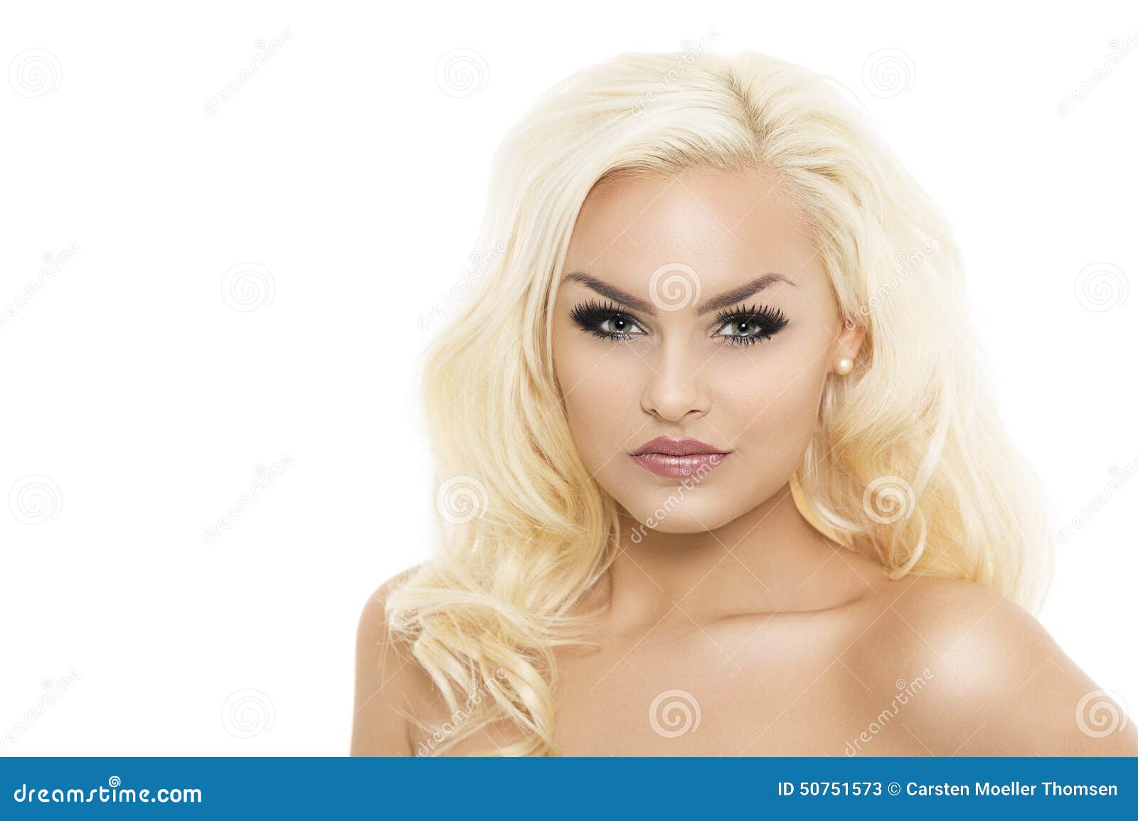 Stockfoto med beskrivningen Seductive blond-haired woman with