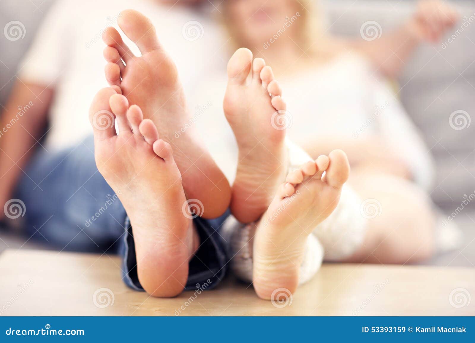 Barefeet of a Happy Couple Lying on a Sofa Stock Image Image of