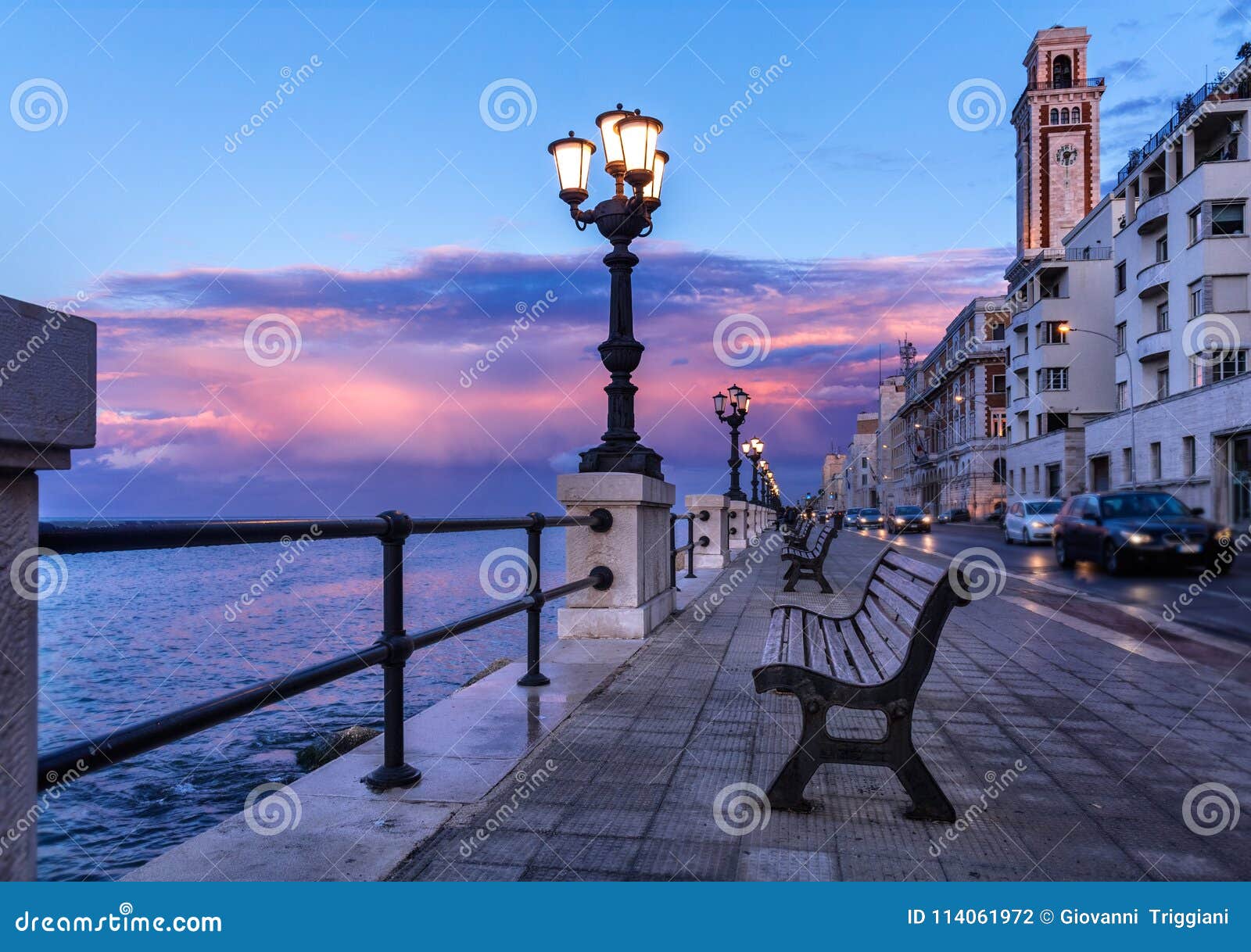 bari seafront. colorful amazing sunset. coastline and city view.