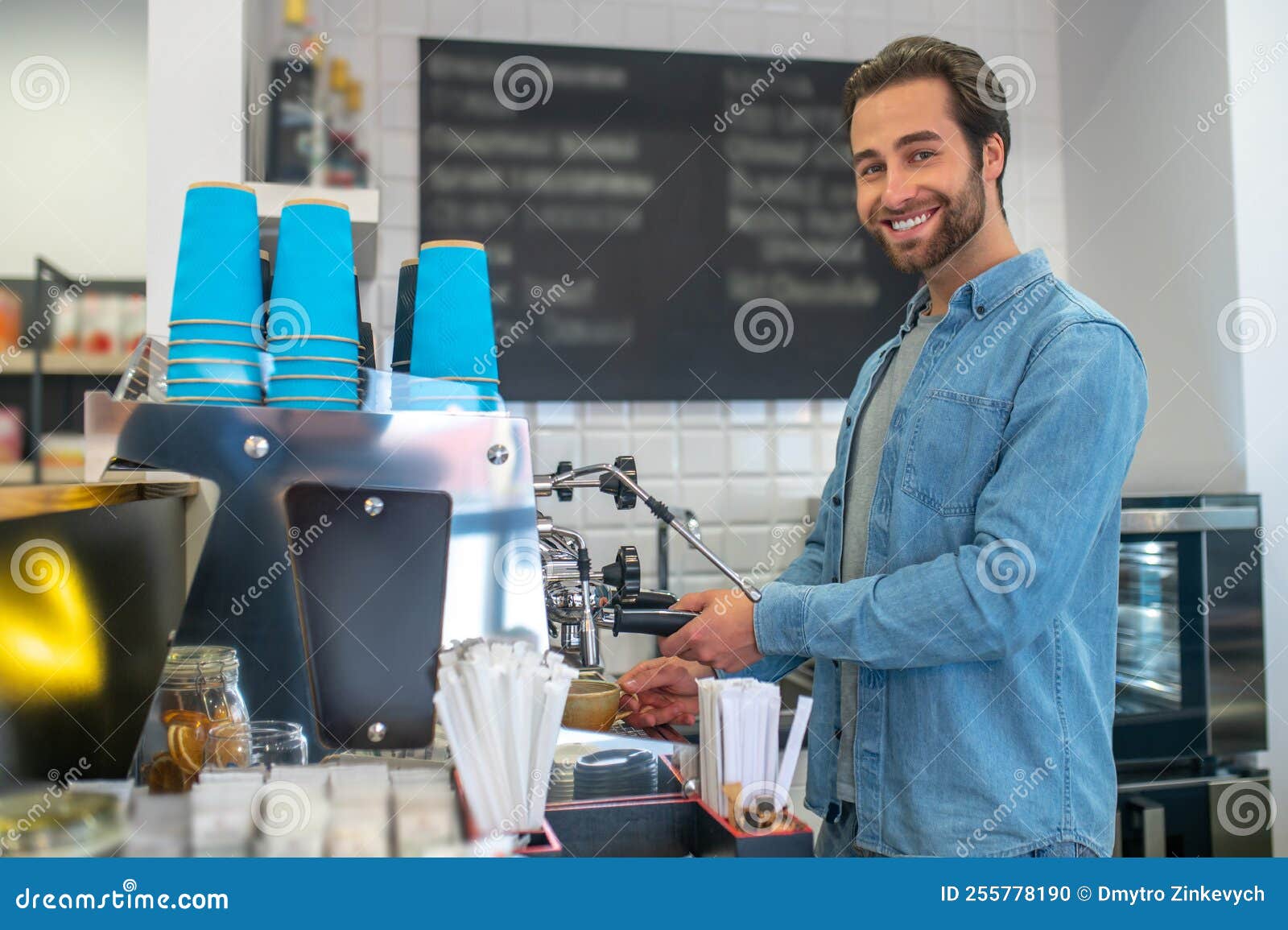 Barista Making Coffee in the Cafe and Looking Contented Stock Photo Image of indoors, owner