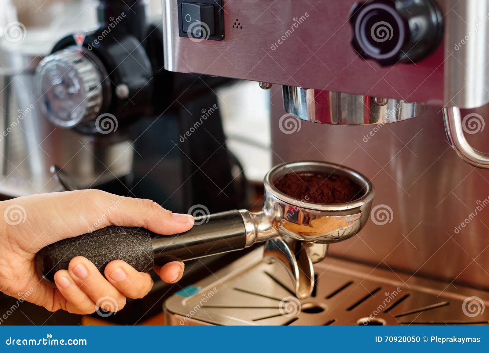 Barista Preparing Coffee in a Cafe. Stock Photo Image of holding