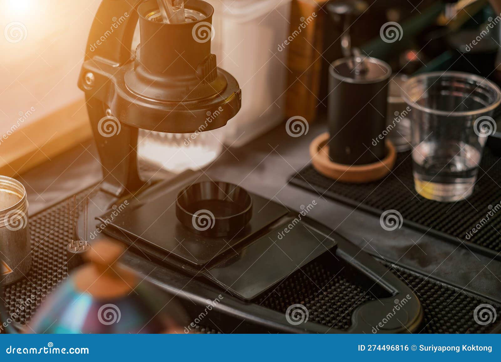 Barista Preparing Coffee Using Chemex Pour Over Coffee Maker and Drip