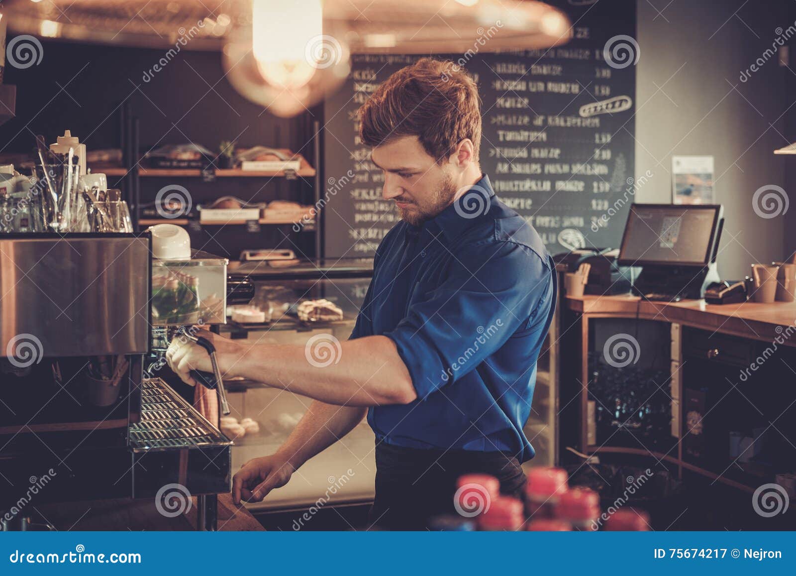 barista preparing cup of coffee for customer in coffee shop.