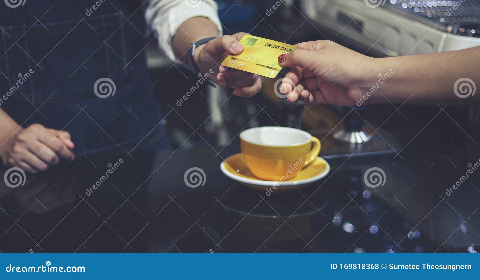 Barista Serving Customer And Woman Is Paying For Coffee By Credit Card In Coffee Shop Stock ...