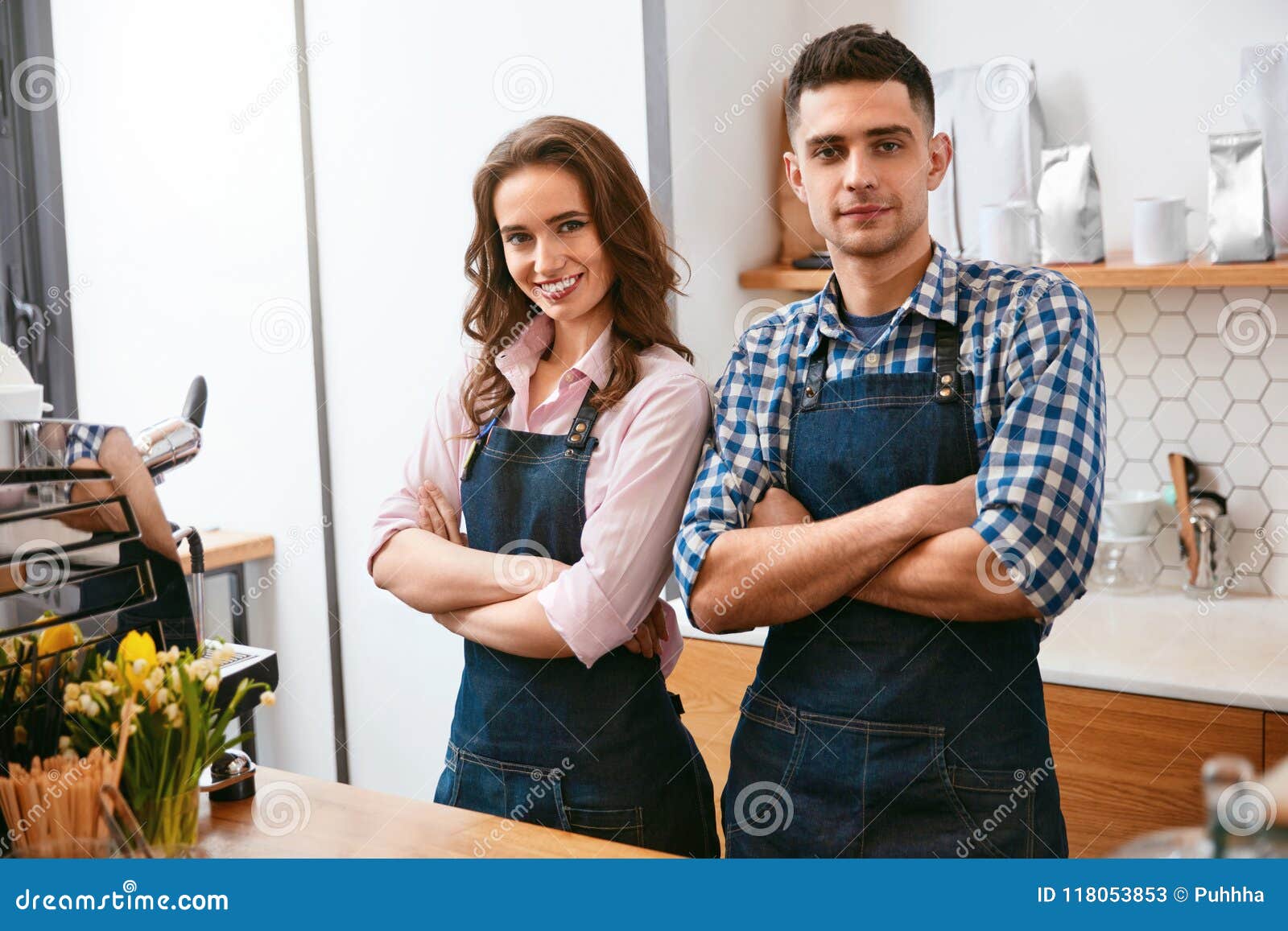 barista and waitress working in cafe