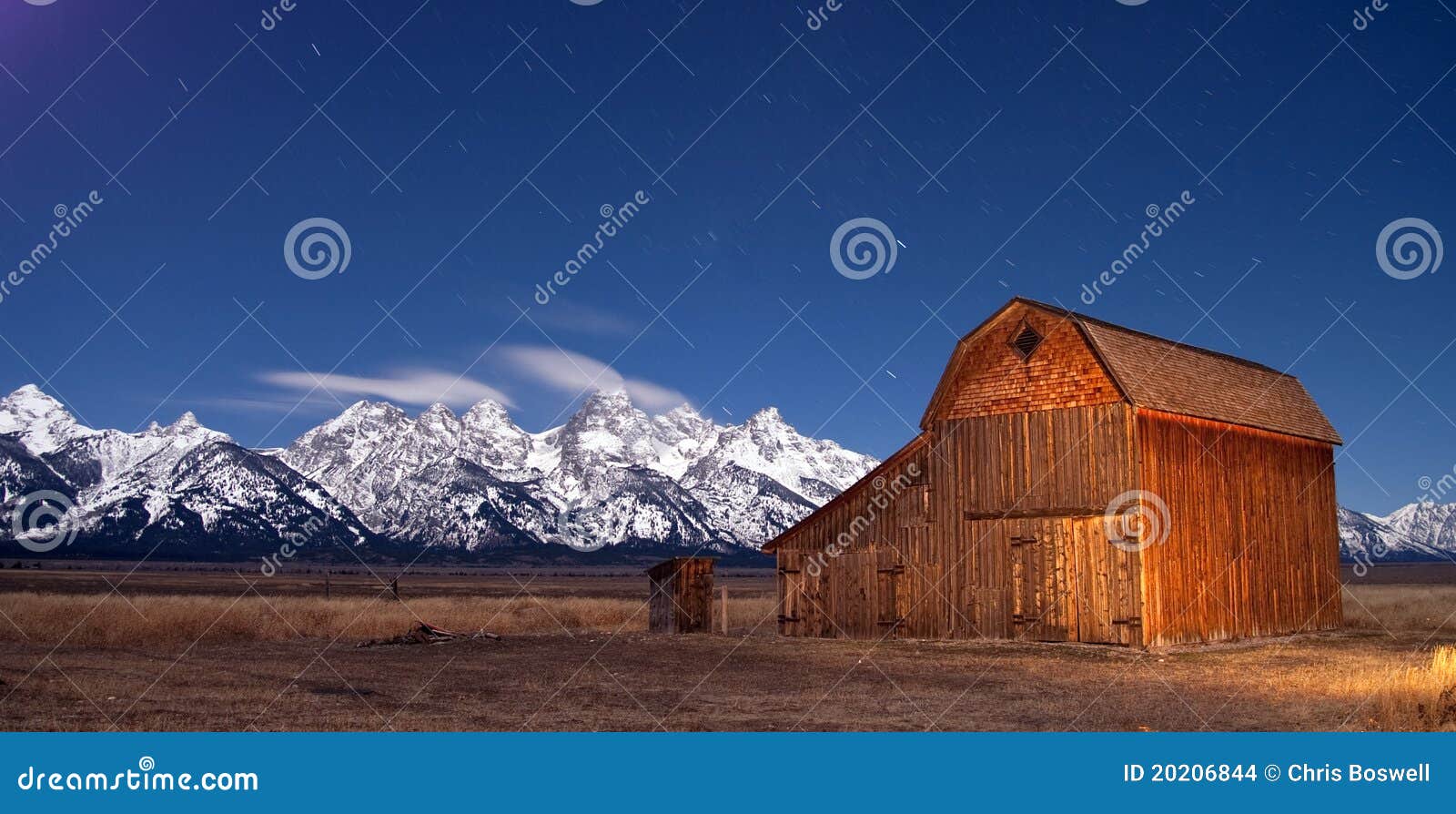 teton wyoming barn at sunset mountains