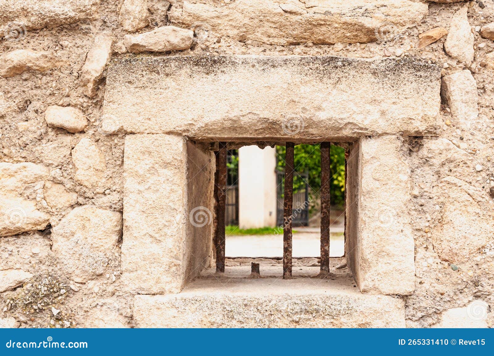 barred window of a security wall