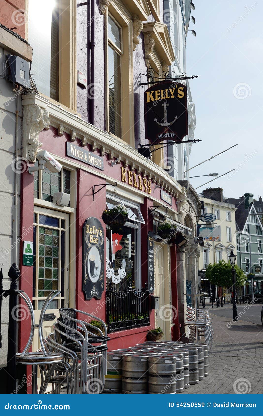 Barrels and Chairs in Front of Kellys Bar Editorial Stock Image Image