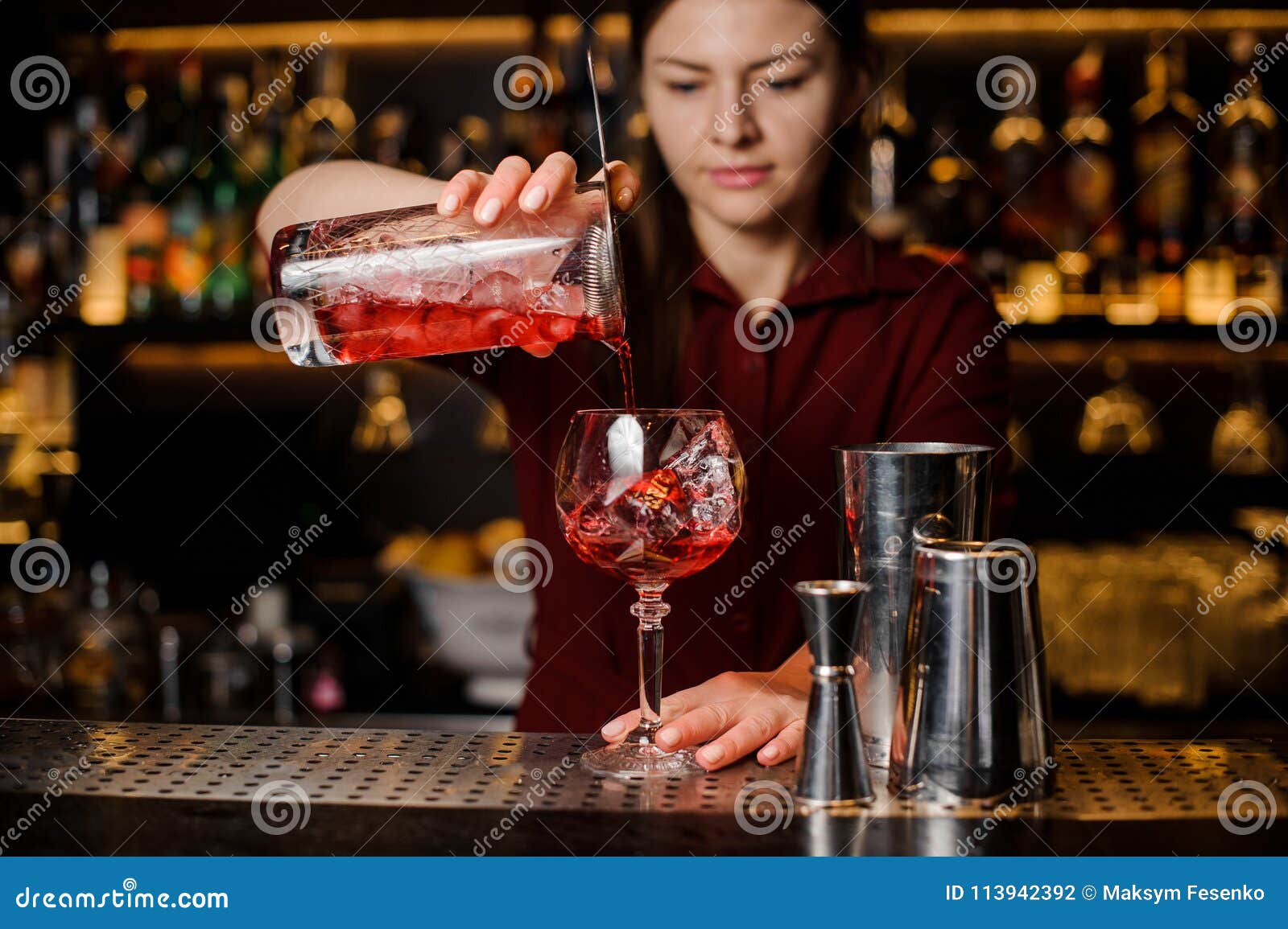 Bartender Girl Pouring a Delicious Light Red Cocktail Stock Photo ...
