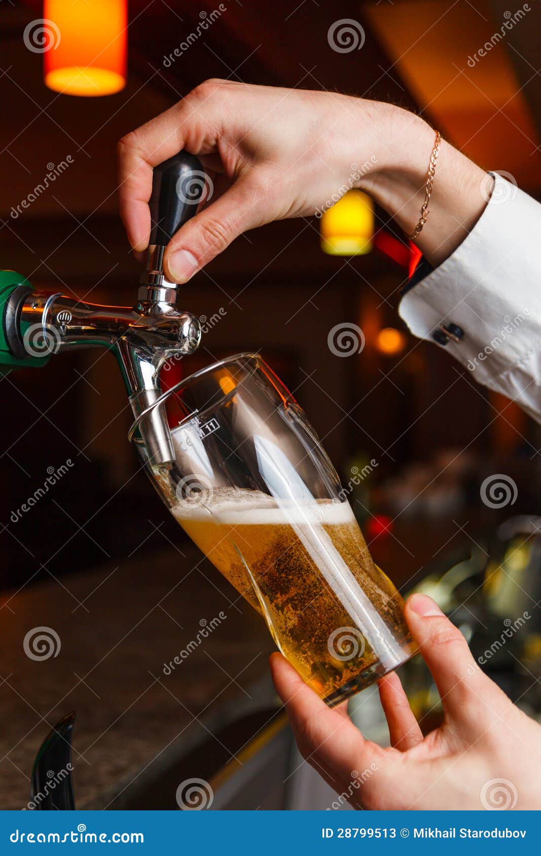 The bartender hand stock image. Image of hold, beer, drink 28799513
