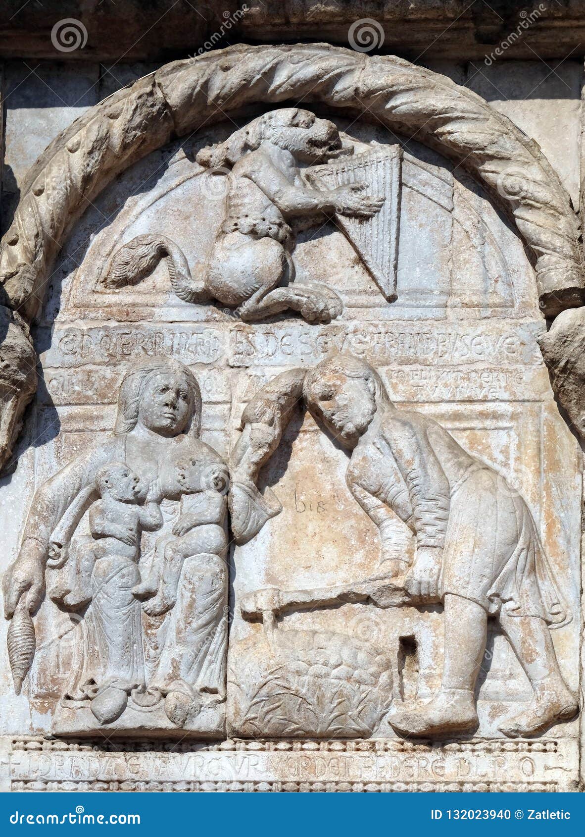 bas-relief of maestro nicolo` 12th century, group to the right of the door of the basilica of st zeno in verona