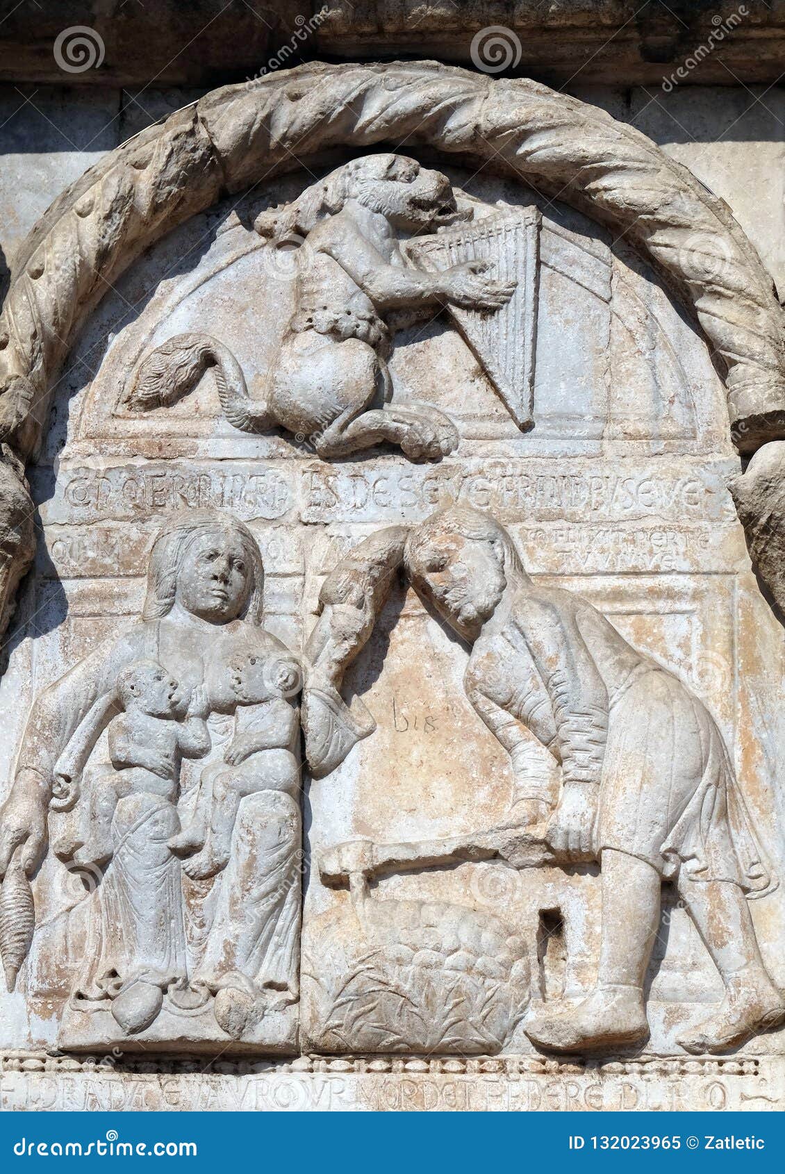 bas-relief of maestro nicolo` 12th century, group to the right of the door of the basilica of st zeno in verona