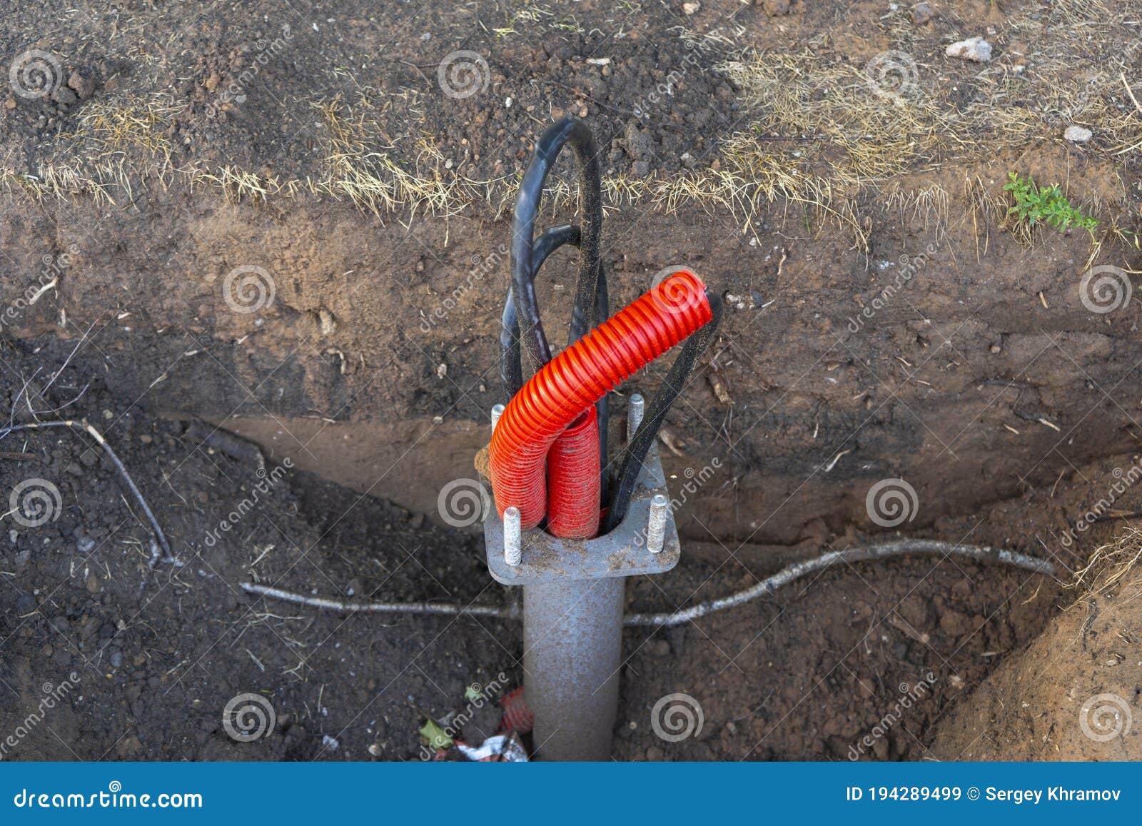 Cable Sticking Out Of Cement Dirty Floor Background Wiring Repair