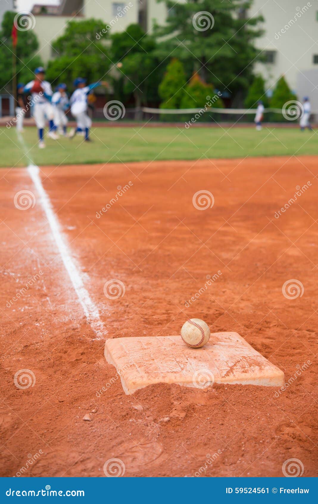 Baseball and Base on Baseball Field with Players Practising Stock Image Image of dirt