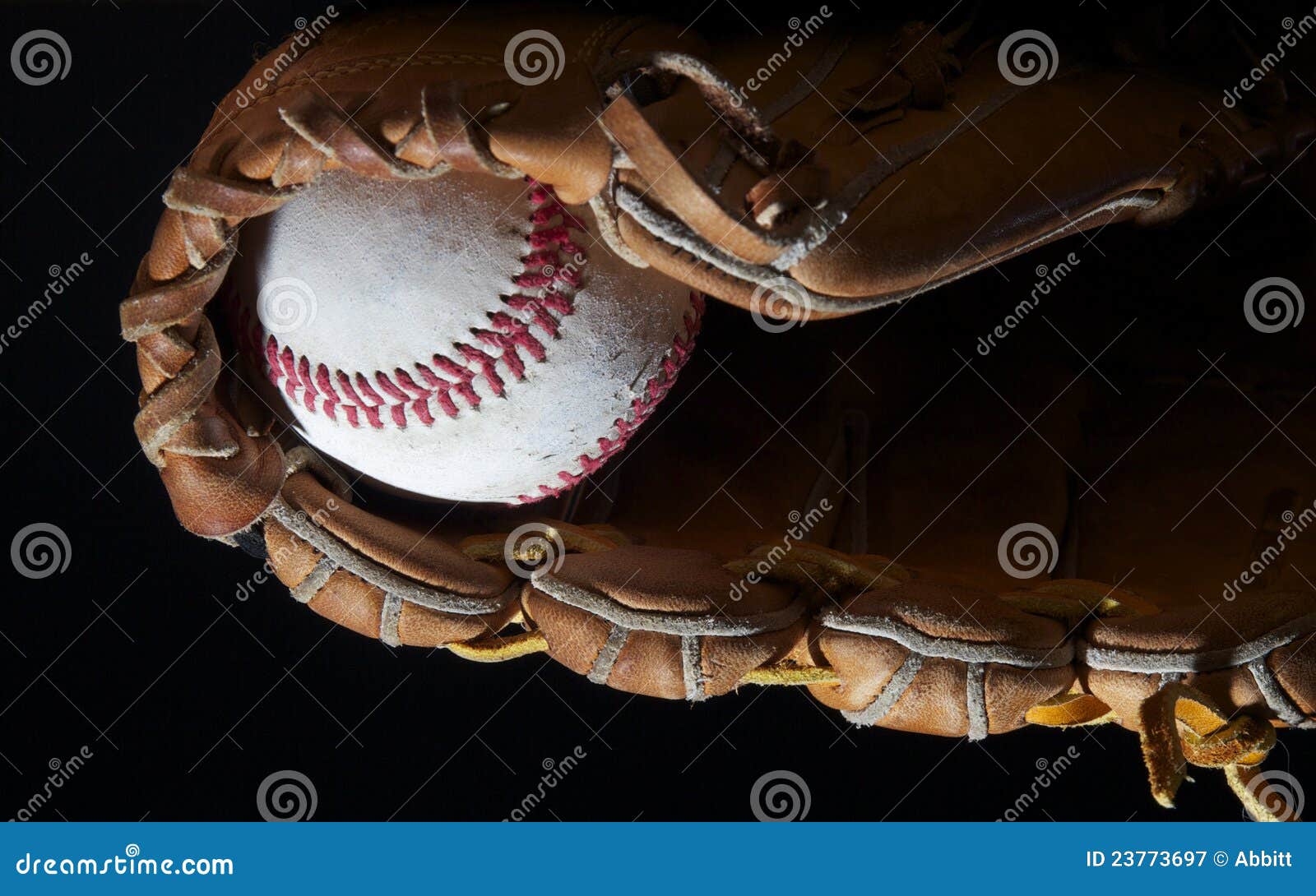 Baseball in mitt on black stock image. Image of equipment 23773697